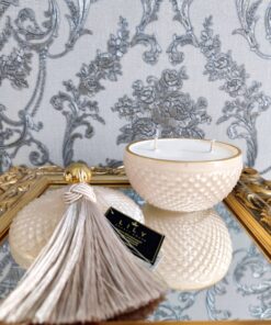 žvakė stikliniame indelyje